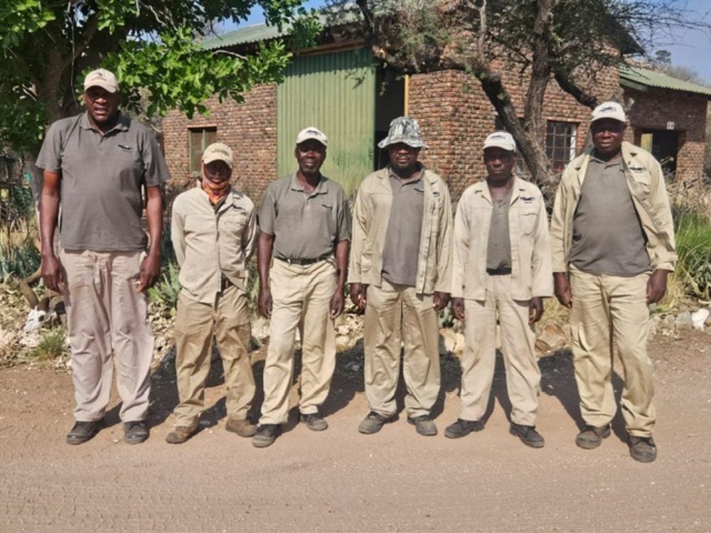 Paul Stones Safari Africa team standing in formation